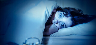 Schlaflos im Bett